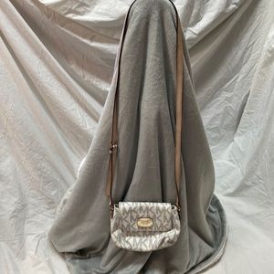 Michael Kors shoulder bag with strap.